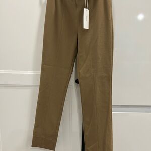 Women’ close fitted tobacco color, Vince Capri with a slit at the ankles